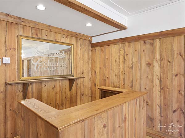 The knotty-pine bar area in the Small Ballroom